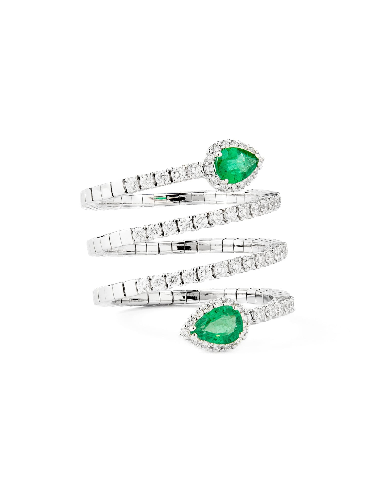 anillo espiral de oro blanco con esmeraldas y diamantes